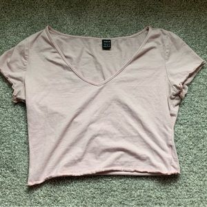 I got this from SHEIN, it’s a light pink, lettuce trimmed crop top